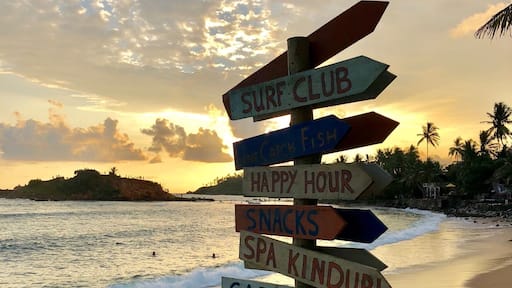 Stunning beach and sunset make for a great photo in Mirissa.