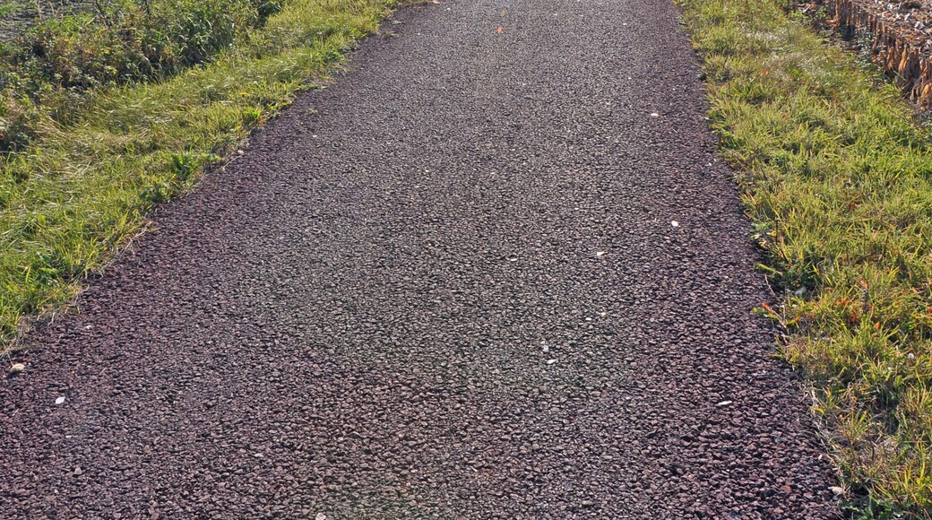 Former railway line #63 Torhout-Kortemark-Ypres (West Flanders, Belgium) between Staden and Kortemark: now broken up and transformed into a bikeway. In the background: the village of Staden.