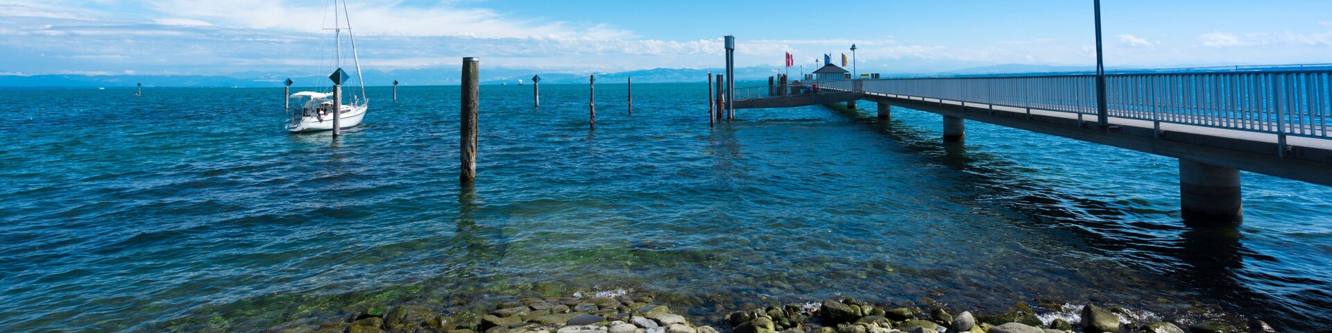 The pier of the village Immenstaad at Lake Constance with zeppelin - Immenstaad, Lake Constance, Baden-Wuerttemberg, Germany, Europe