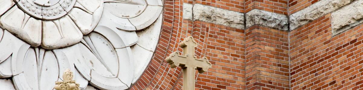 Cross on the facade of St Willebrord Catholic Church in Green Bay, WI