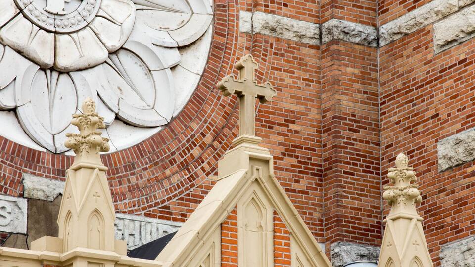 Cross on the facade of St Willebrord Catholic Church in Green Bay, WI