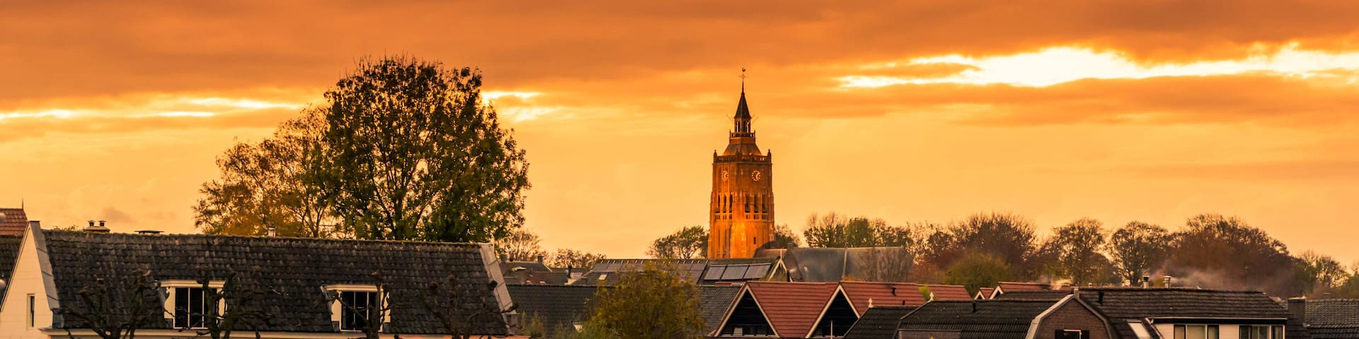 City skyline view of Leerdam the netherlands at sunset, a typical dutch city.