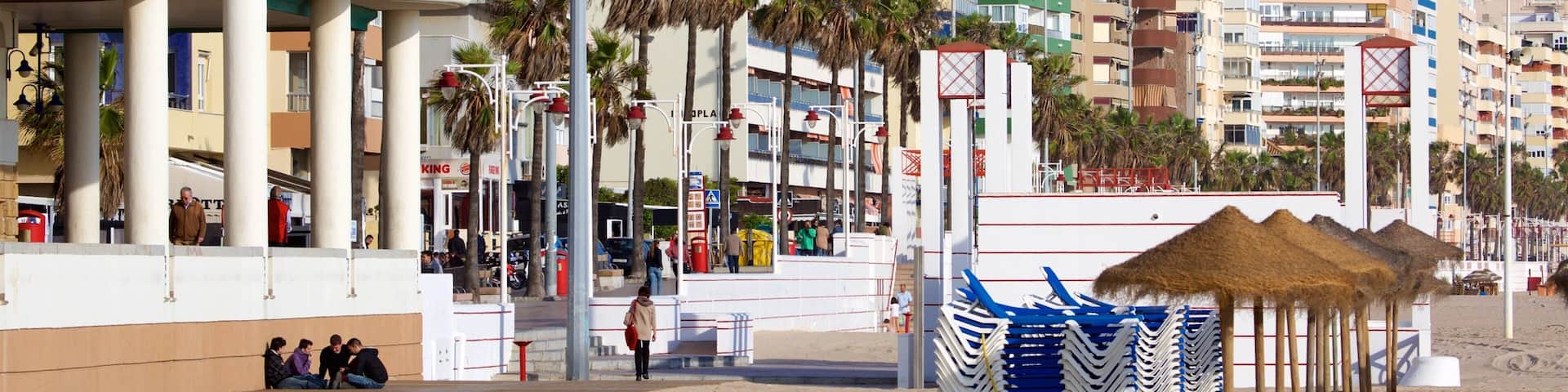 Victoria Beach showing a sandy beach and a coastal town