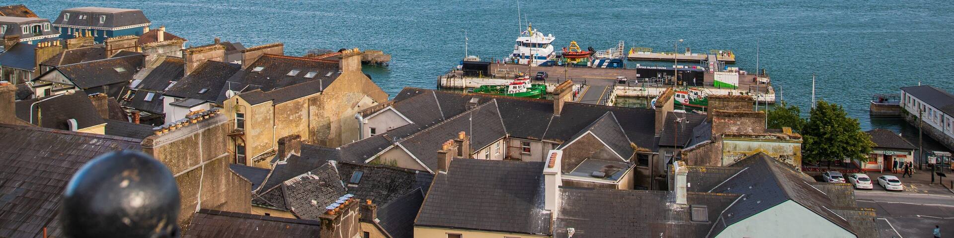 Spike Island showing a bay or harbor and a coastal town