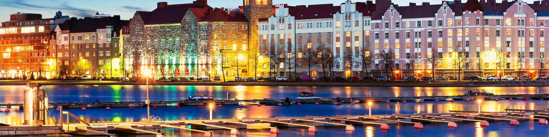 Scenic evening panorama of sea pier illuminated architecture in Hakaniemi district in Helsinki, Finland; Shutterstock ID 228028924