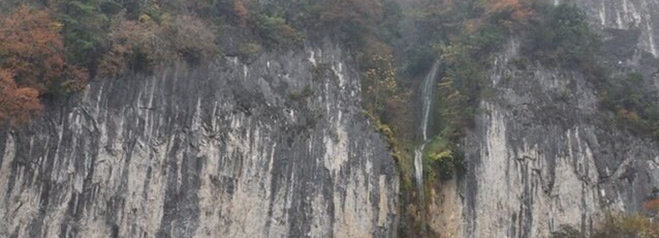 In Niimi in northwestern Okayama.
The Ikura-do Cave is located in the 240-meter tall vertical, limestone cliff side. 
It was a foggy day, which is why we went to the caves rather than do some other sightseeing we had planned, but the caves were really cool and we weren't sad about the weather, at all!