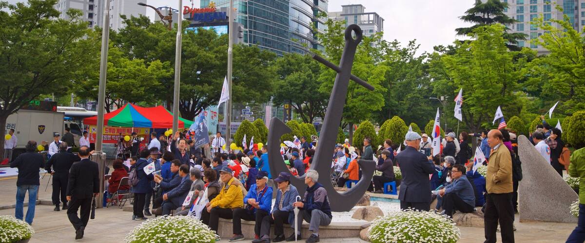 Yeonsan which includes flowers and a city as well as a large group of people