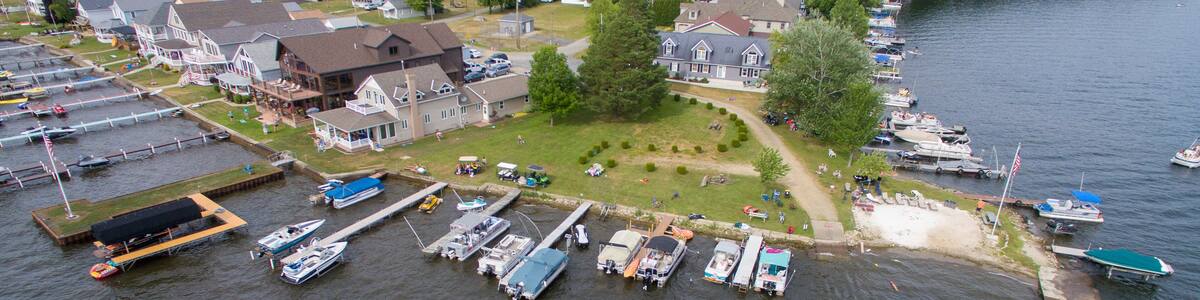 Docked boats on the lake front view
