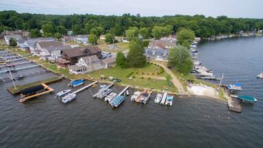 Docked boats on the lake front view