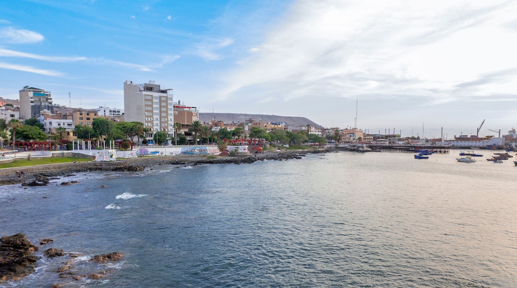 Aerial view of Ilo Port at sunset with ships and industrial piers, Moquegua, Peru