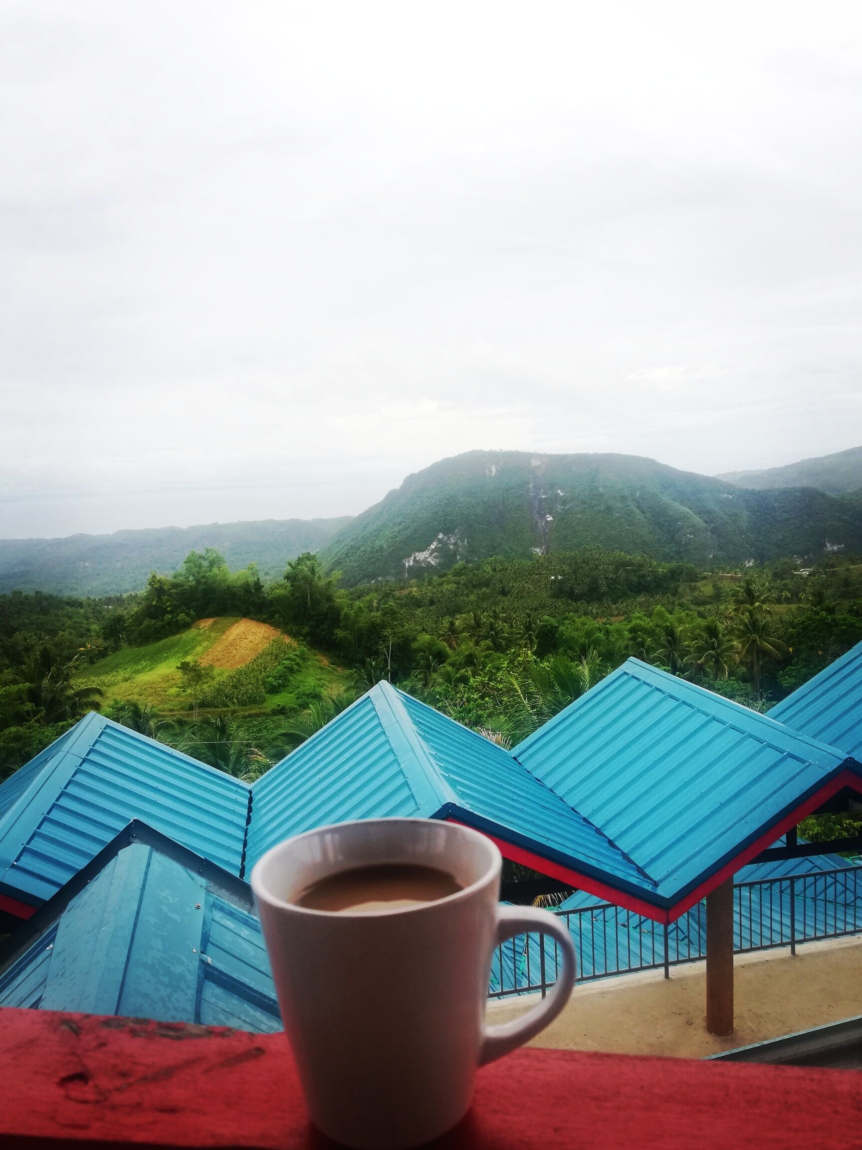 Having a cup coffee while enjoying the view in this new resort in south Cebu Philippines. A good place to unwind.