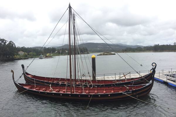 Replicas of Viking longboats on the RĂo Ulla. These are used in reenactments of Viking landings and festivals.