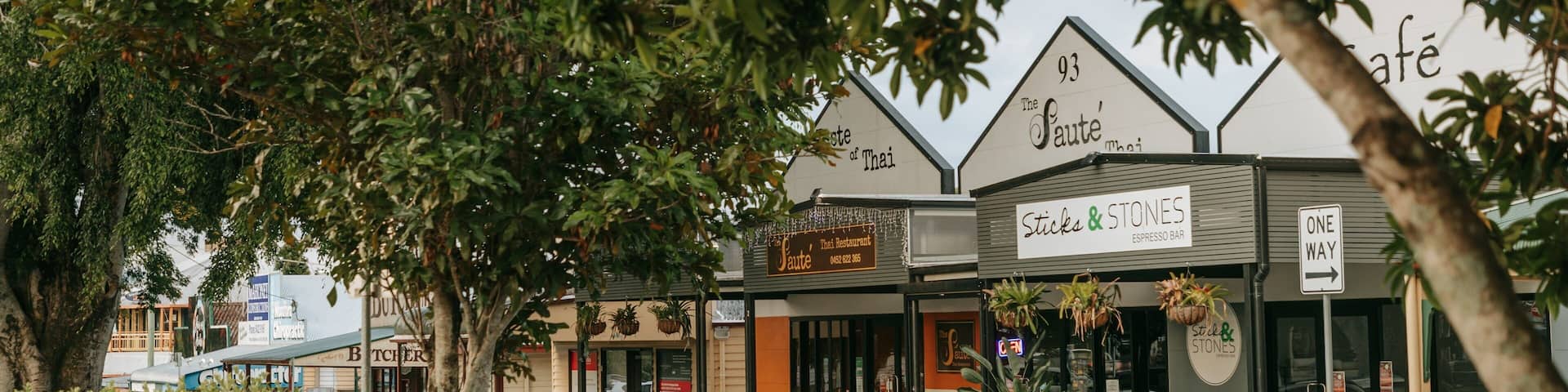 Woodford featuring a small town or village and signage