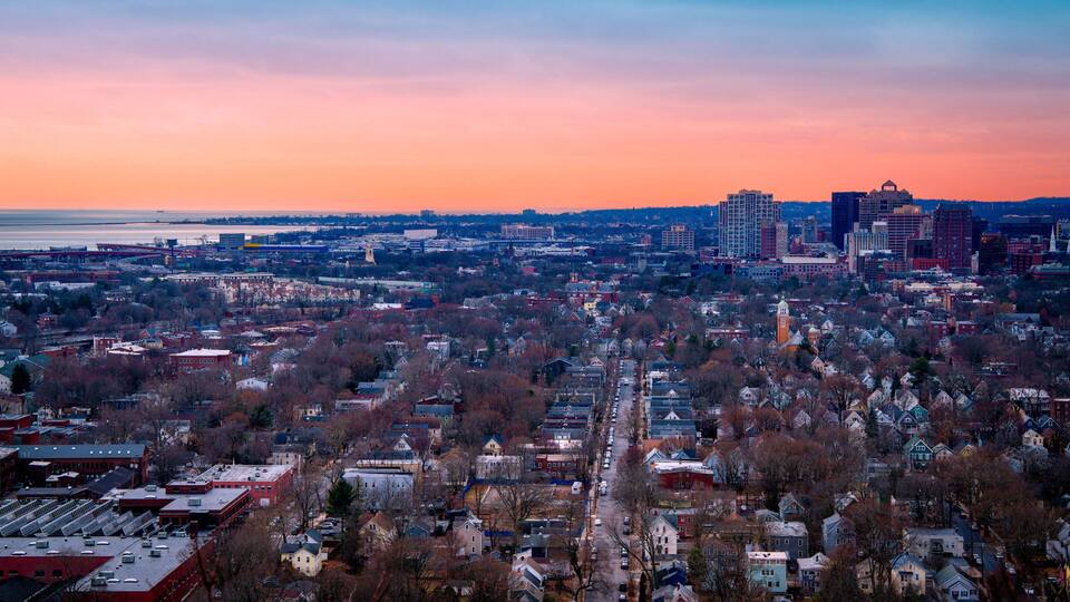New Haven Connecticut Skyline, downtown buildings and houses viewed from East Rock Park Summit