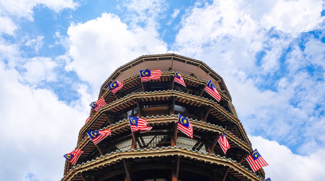 Leaning Tower of Teluk Intan, Perak, Malaysia Decorated with Malaysian Flags under a Blue Sky