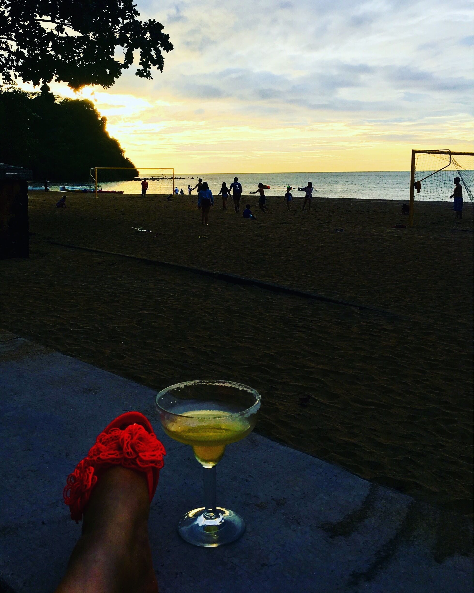 Enjoy sipping an iced mango margarita after an awesome beach volleyball game ... then gaze languidly at the glorious sunset 😍