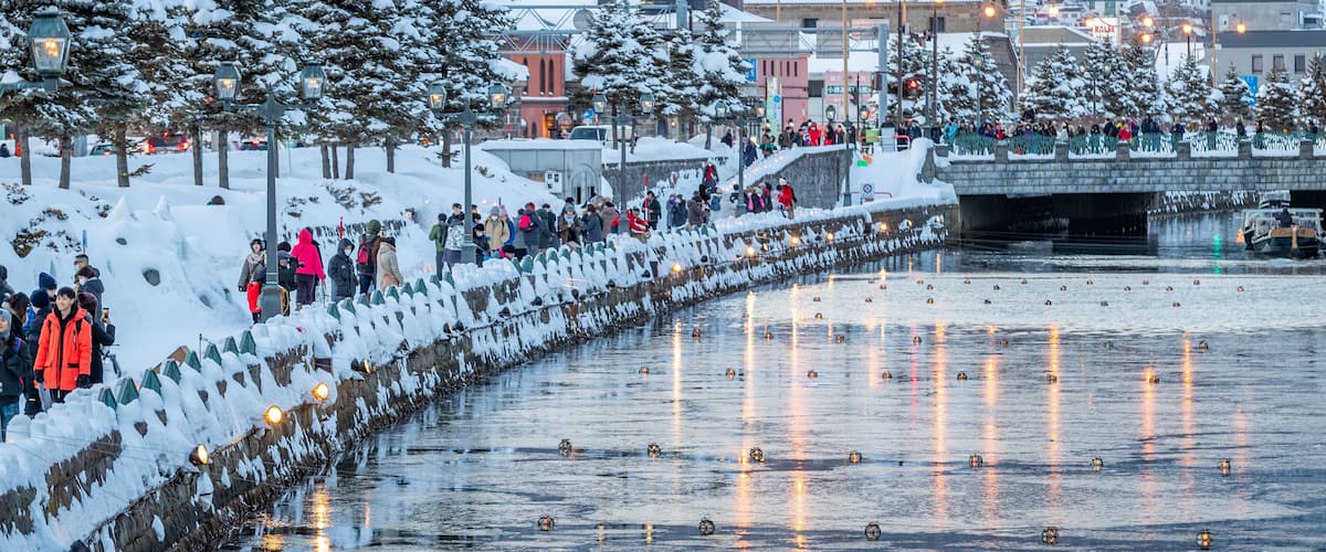 Otaru Canal which includes a river or creek and snow