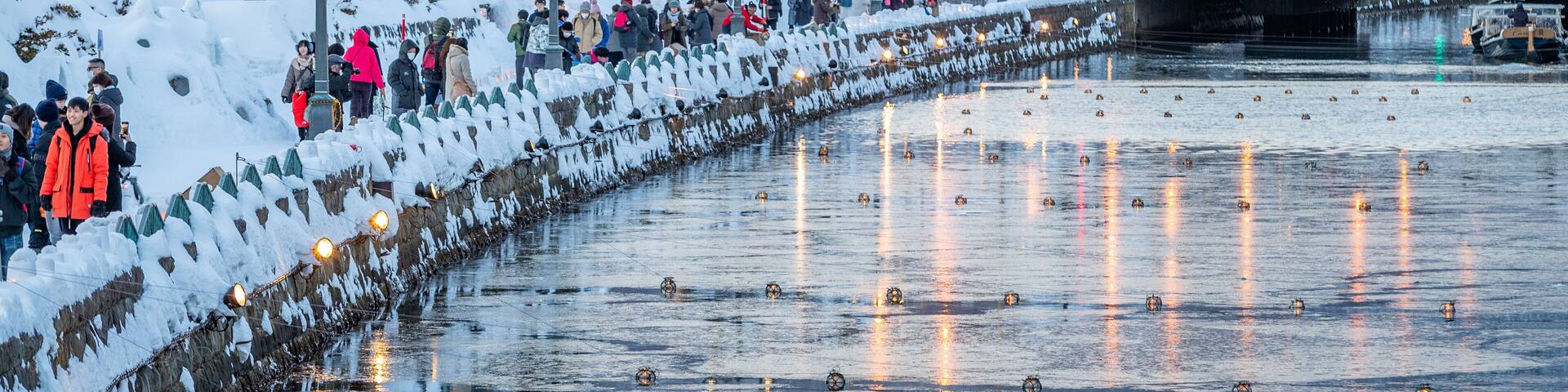 Otaru Canal which includes a river or creek and snow