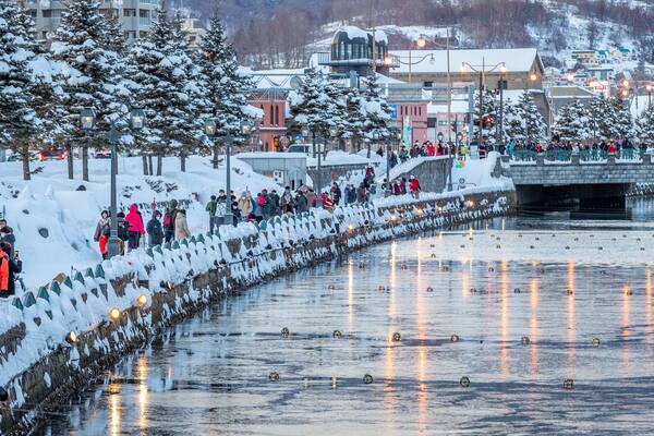 Otaru Canal which includes a river or creek and snow