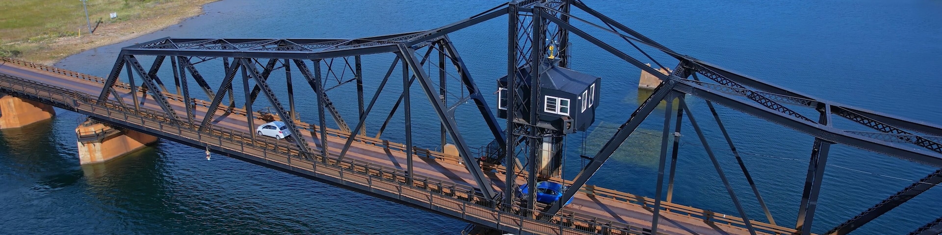 Aerial view of single lane traffic on Little Current Swing Bridge, Manitoulin Island. The bridge crosses North Channel on Highway 6. The historic bridge will be replaced with new two lane bridge.