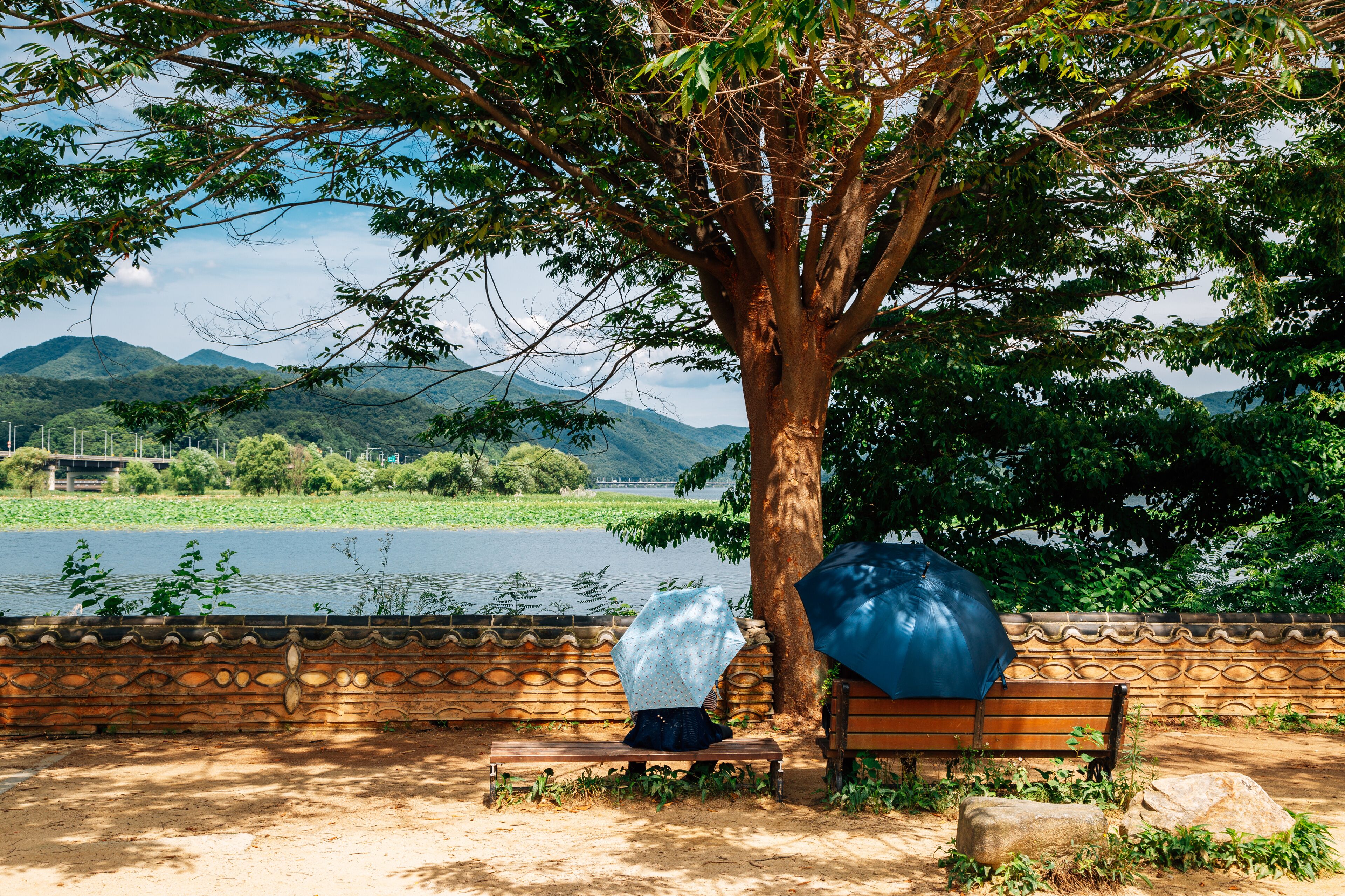 Korean traditional stone wall with river and mountain at Dumulmeori in Yangpyeong, Korea