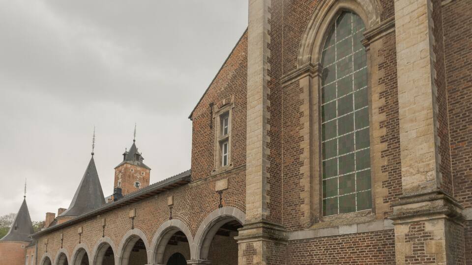 A historic building with arched windows and a brick facade.