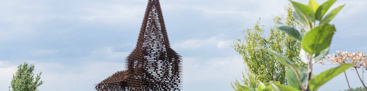 Lovely see-through church in Borgloon, Belgium. A charming little town in the province of Limburg. You make little and easy hikes in the surroundings throug the typical fruit trees. #belgium #doorkijkkerk #troveon #europe #church