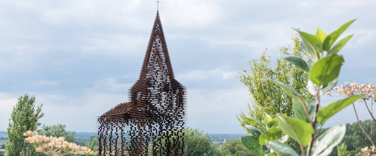 Lovely see-through church in Borgloon, Belgium. A charming little town in the province of Limburg. You make little and easy hikes in the surroundings throug the typical fruit trees. #belgium #doorkijkkerk #troveon #europe #church