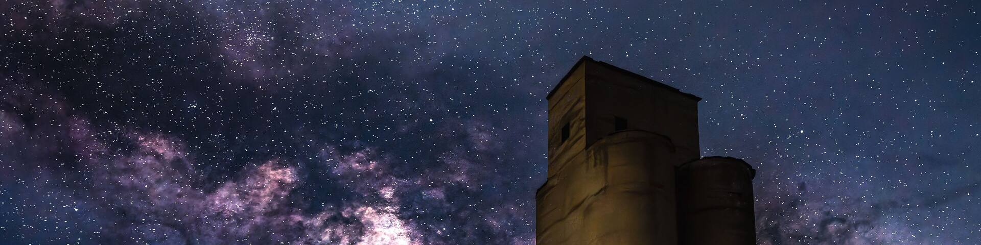 Abandoned silo the Milky Way in the background