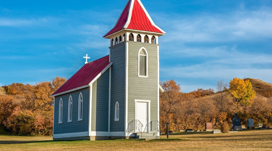 Fall colors surrounding St. Nicholas Anglican Church, also known as Little Church in the Valley, near Craven, SK