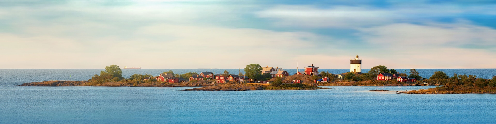 Beautiful panoramic nightly seascape with lighthouse