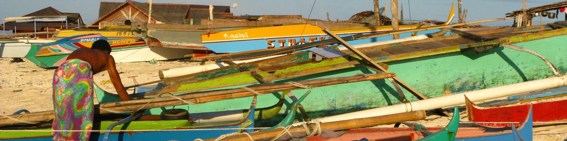 Malaysia which includes boating, a beach and a coastal town