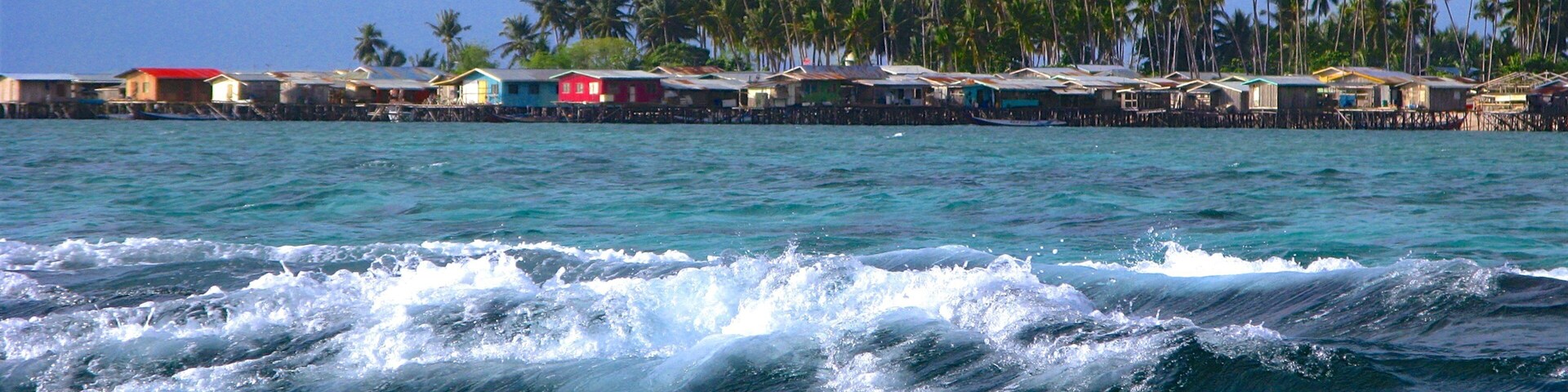 Mabul Island showing general coastal views and surf