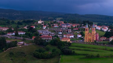 Aerial view from a drone of the neo-Gothic Church of San Pedro Ad Enlace in the town of Cóbreces, in the municipality of Alfoz de Loredo. Cóbreces, Cantabria, Spain, Europe