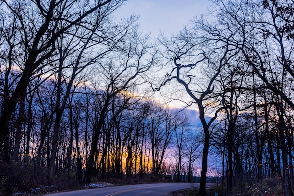 Sunset on the road through New Glarus Woods State Park in Wisconsin