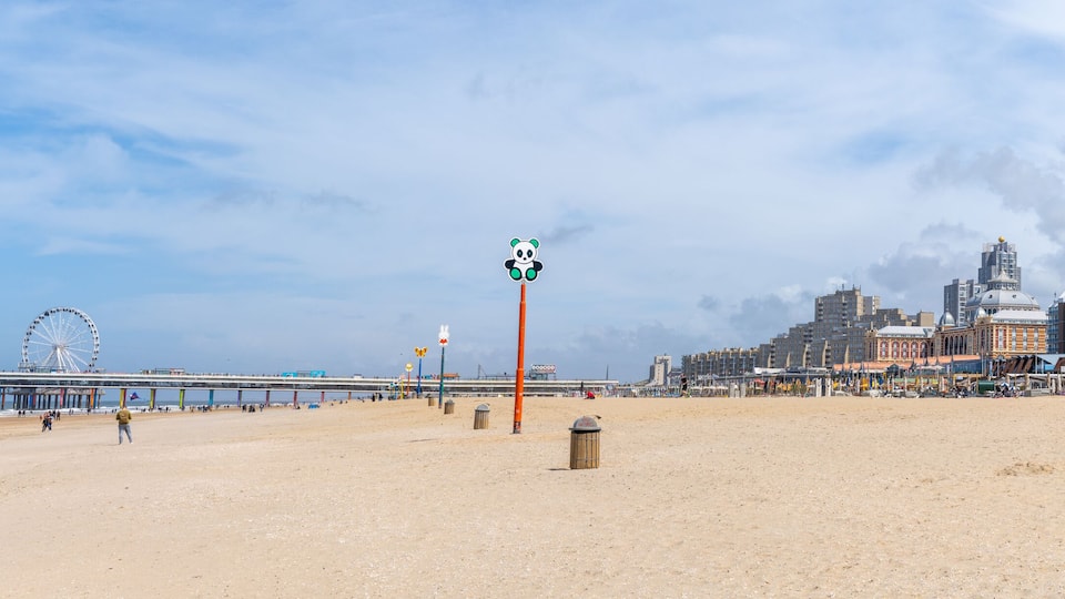 panorama view of the long sandy beach in the Dutch seaside resort of Scheveningen near The Hague