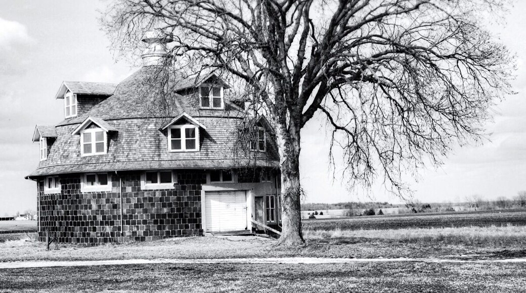 Found this place while driving to find a place to camp. Saw it from the highway. It was built in 1902, is on the historic local registry, is for sale!, is completely round, and has a bunch of garages. That's about all I know about it other then it looks awesome! I drove straight up to it. Parked in driveway, and walked around. It was for sale so it was pretty easy to walk around. Cool place! Never seen anything like it.