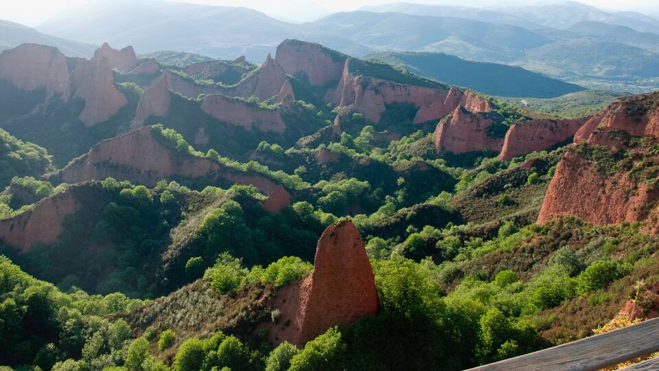 Beautiful landscape with red mountains and green fields. Las Medulas, Leon, Castilia, Spain. Europe