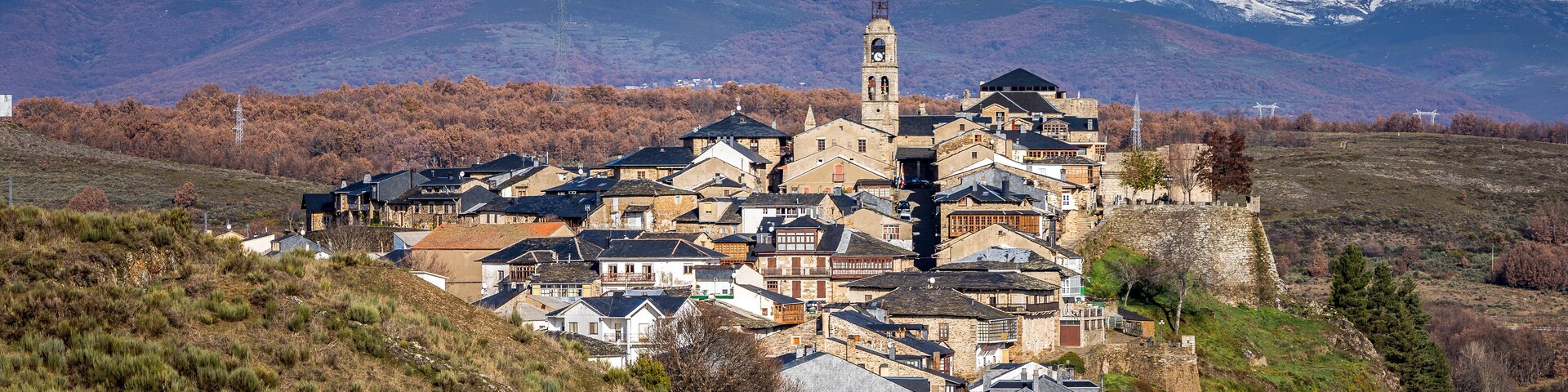 View of the village of Puebla de Sanabria (Zamora) and snow covered mountains.
