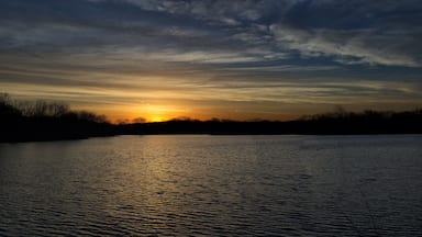 Sunrise over a lake near the Des Moines river