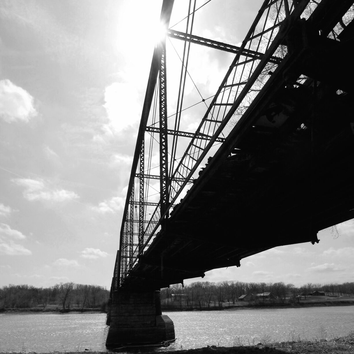 Found this bridge while exploring. It used to be a railroad bridge, transformed to a buggy bridge, and not after restoration is a walking path bridge. It stretches over a hundred feet and while walking you can still see the old railroad and boards for the buggy. 