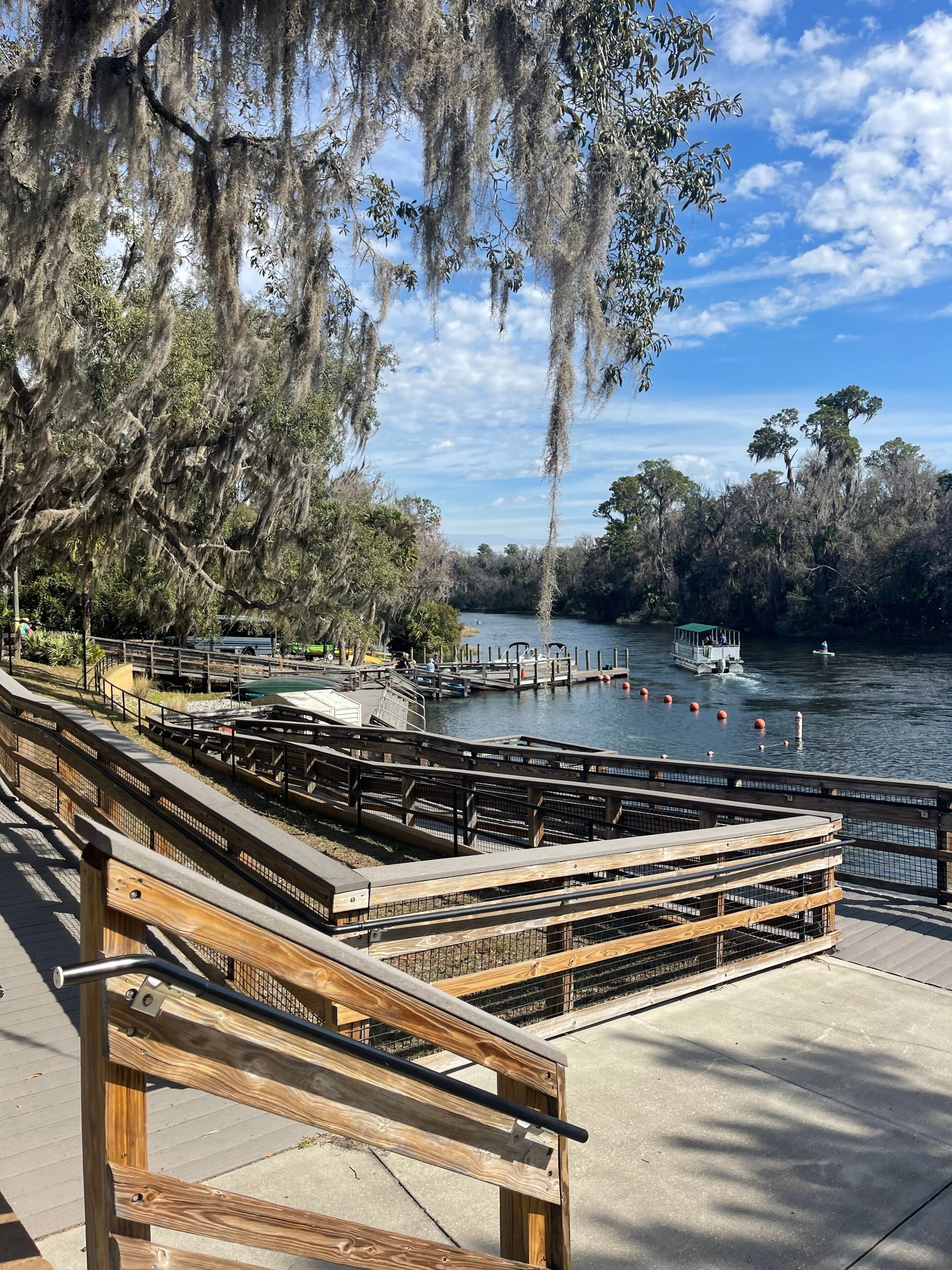 Kayaks and docks line KP Hole County Park on the Rainbow River, Dunnellon, Florida