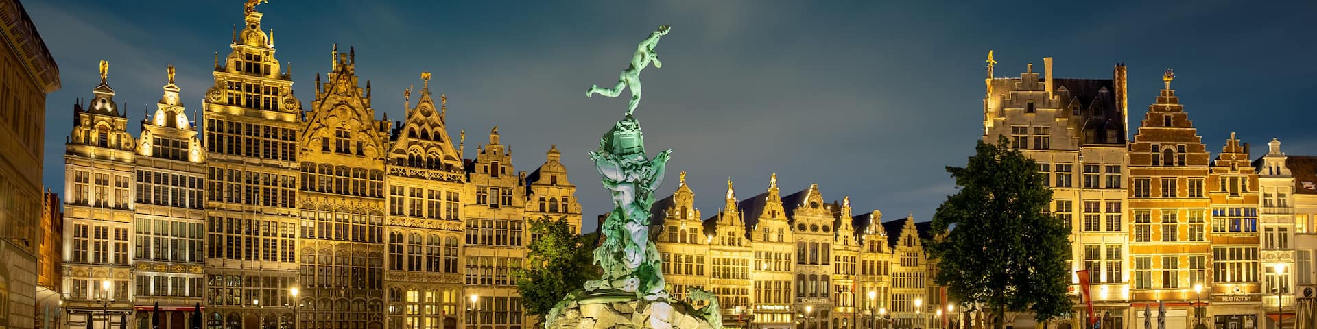 Brabo fountain at the Grote Markt square of Antwerp after sunset