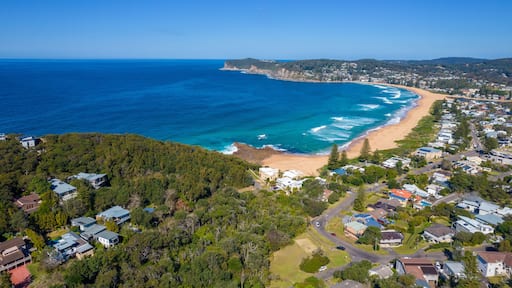 Blue ocean with large waves crashing on to North Avoca Shoreline in New South Wales Australia