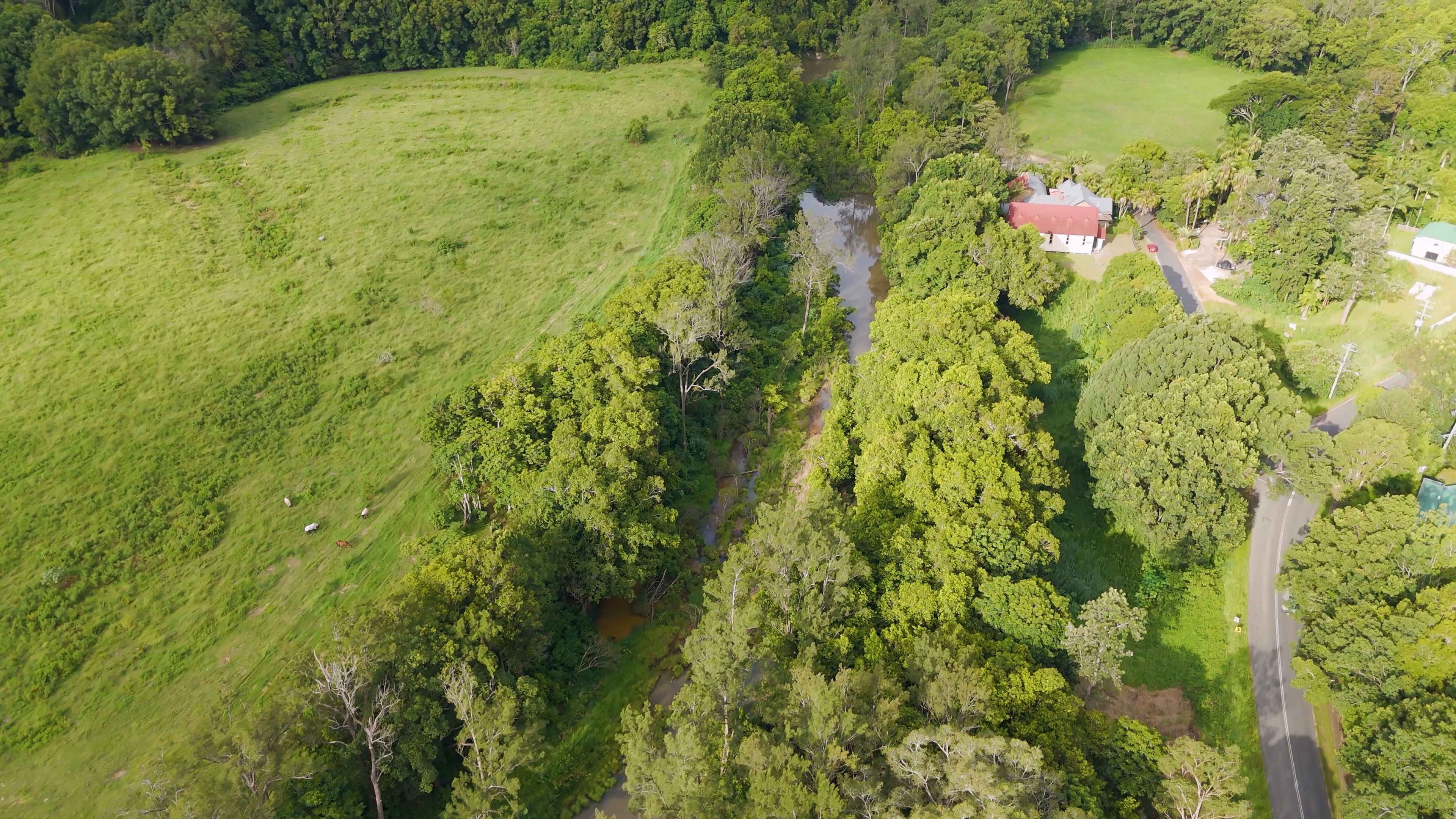 Aerial View of Tweed River Flowing Through Lush Uki Farmland