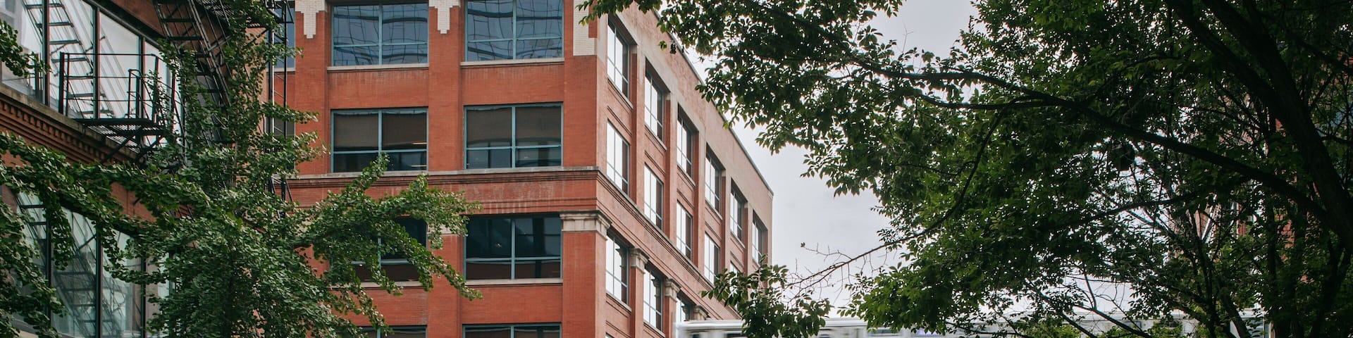 River North showing railway items, street scenes and a city