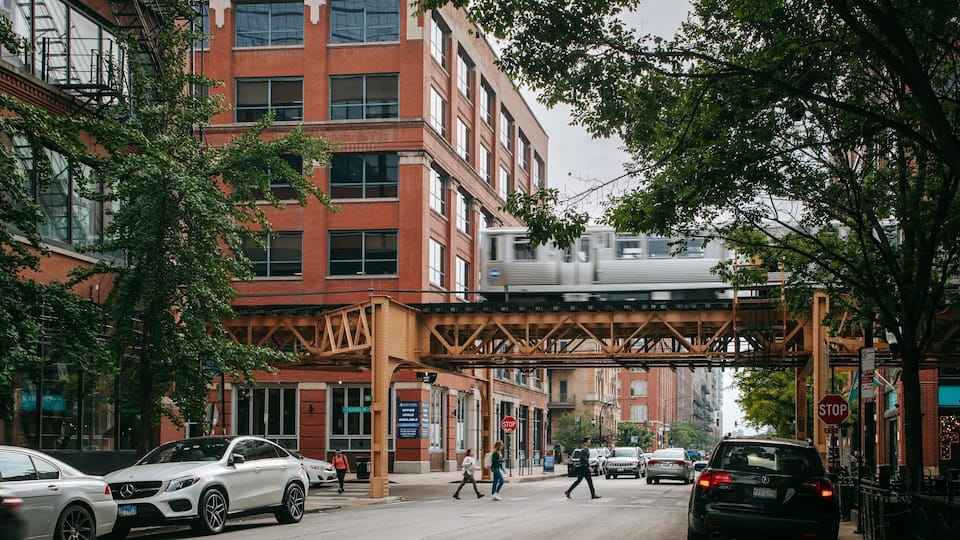 River North showing railway items, street scenes and a city