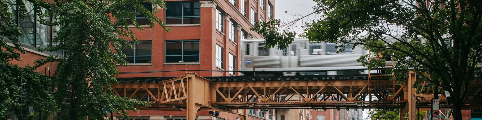 River North showing railway items, street scenes and a city