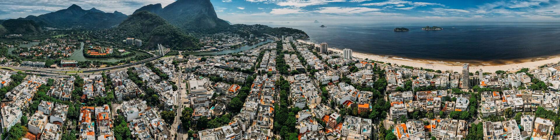 Aerial panoramic view of Pepe Beach and Pedra da Gavea in Barra da Tijuca district, an upscale neighborhood on the west side of Rio de Janeiro, Brazil, South Amereica