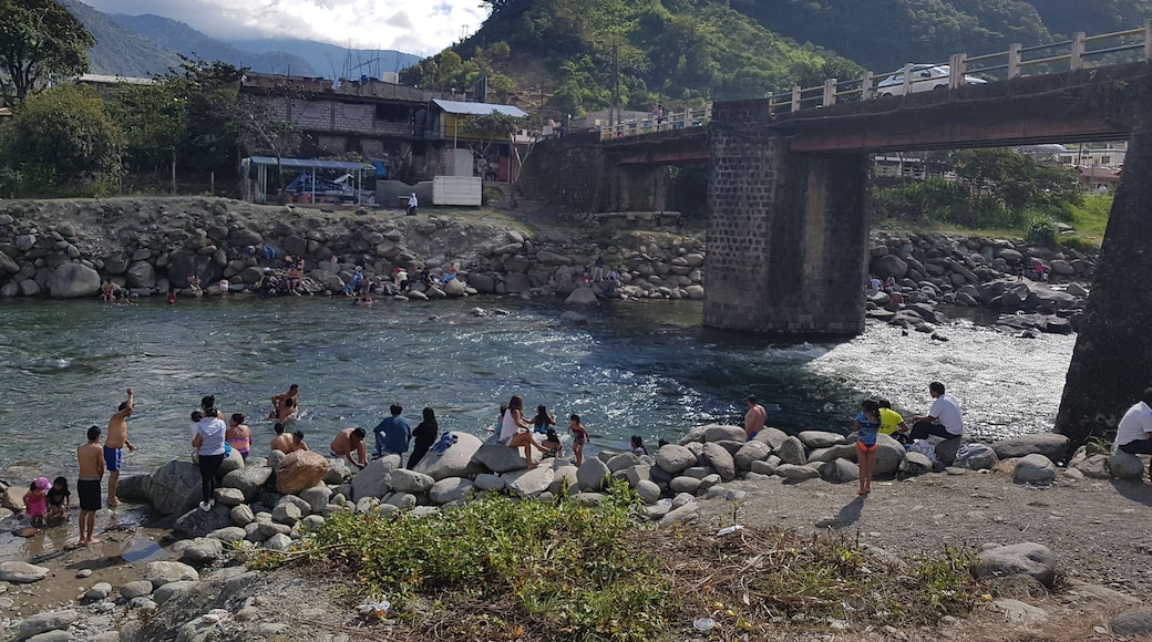 Locals taking a break from the climate. Rio Verde, Ecuador